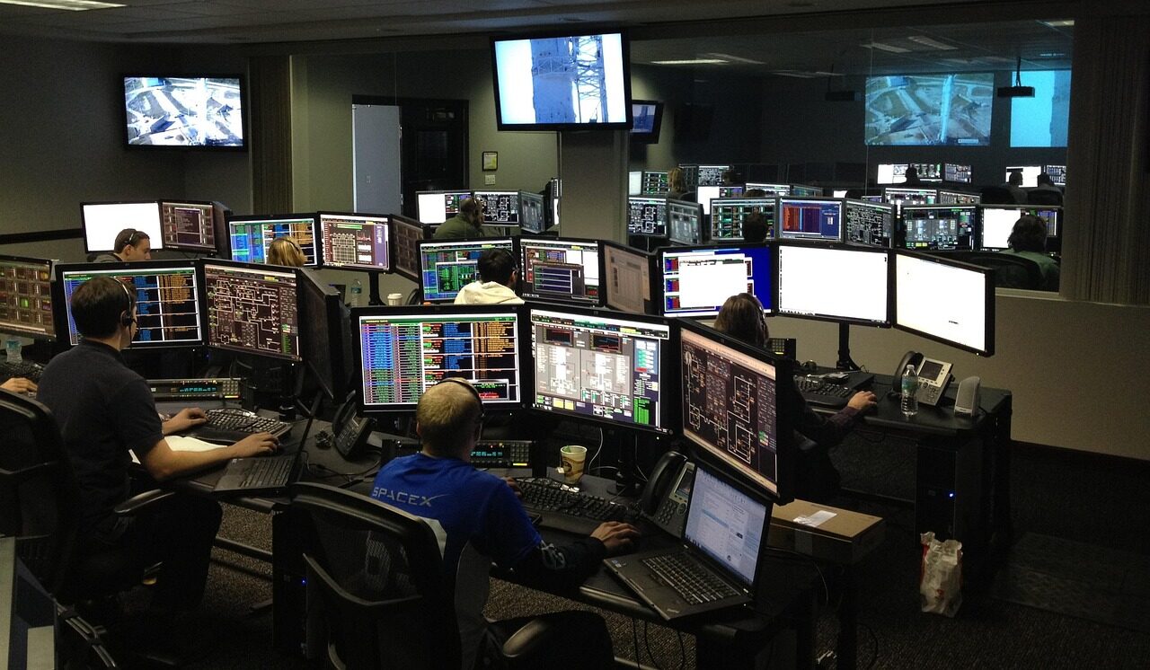 A staffed security operations centre monitoring live threat feeds around the clock.